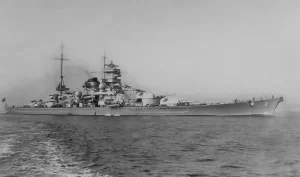 To Scharnhorst &epsilon;ί&chi;&epsilon; &kappa;&omega;&delta;&iota;&kappa;&omicron;&pi;&omicron;&iota;&eta;&theta;&epsilon;ί &alpha;&rho;&chi;&iota;&kappa;ά &omega;&sigmaf; &beta;&alpha;&rho;ύ &kappa;&alpha;&tau;&alpha;&delta;&rho;&omicron;&mu;&iota;&kappa;ό &gamma;&iota;&alpha; &nu;&alpha; &epsilon;&pi;&iota;&tau;&rho;έ&psi;&epsilon;&iota; &sigma;&tau;&eta; &Gamma;&epsilon;&rho;&mu;&alpha;&nu;ί&alpha; &nu;&alpha; &tau;&omicron; &epsilon;&nu;&tau;ά&xi;&epsilon;&iota; &sigma;&tau;&eta; &delta;ύ&nu;&alpha;&mu;&eta; &tau;&omicron;&upsilon; &nu;&alpha;&upsilon;&tau;&iota;&kappa;&omicron;ύ &tau;&eta;&sigmaf; &kappa;&alpha;&theta;ώ&sigmaf; &omicron;&iota; ό&rho;&omicron;&iota; &tau;&omega;&nu; &Beta;&epsilon;&rho;&sigma;&alpha;&lambda;&lambda;&iota;ώ&nu; &alpha;&pi;&alpha;&gamma;ό&rho;&epsilon;&upsilon;&alpha;&nu; &tau;&eta;&nu; &alpha;&pi;ό&kappa;&tau;&eta;&sigma;&eta; &theta;&omega;&rho;&eta;&kappa;&tau;ώ&nu;. &Omega;&sigma;&tau;ό&sigma;&omicron;, &mu;&epsilon; &tau;&eta;&nu; ά&nu;&omicron;&delta;&omicron; &tau;&omicron;&upsilon; &Chi;ί&tau;&lambda;&epsilon;&rho; &sigma;&tau;&eta;&nu; &epsilon;&xi;&omicron;&upsilon;&sigma;ί&alpha; &alpha;&upsilon;&tau;ό &kappa;&alpha;&iota; &tau;&omicron; &alpha;&delta;&epsilon;&rho;&phi;ό &tau;&omicron;&upsilon; &pi;&lambda;&omicron;ί&omicron;, "Gneisenau" &kappa;&omega;&delta;&iota;&kappa;&omicron;&pi;&omicron;&iota;ή&theta;&eta;&kappa;&alpha;&nu; &epsilon;&kappa; &nu;έ&omicron;&upsilon; &omega;&sigmaf; "Schlachtschiffs" (&theta;&omega;&rho;&eta;&kappa;&tau;ά).